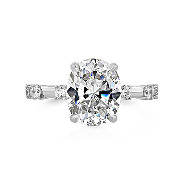 Hidden Halo Oval Moissanite Side Stone Engagement Ring