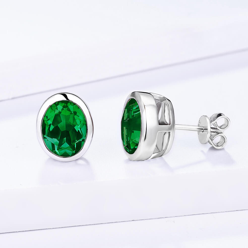 Oval Lab-Created Emerald Bezel Sterling Silver Stud Earrings - ReadYourHeart