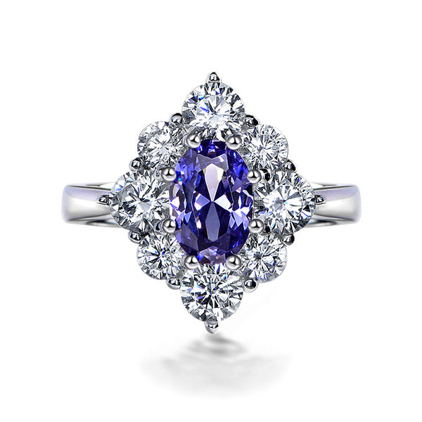 Oval Cut Sapphire Eight Prong Sterling Silver Halo Ring