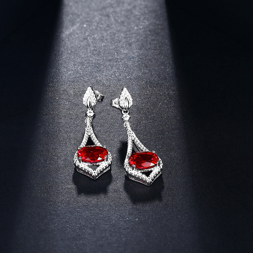 Oval Ruby Sterling Silver Drop Halo Earrings - ReadYourHeart